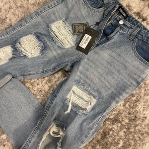 Rebellious high waisted, distressed jeans.